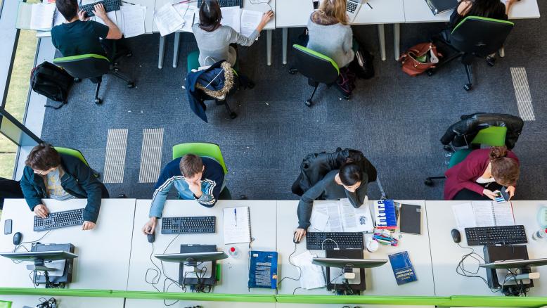 Aerial view of students at computers