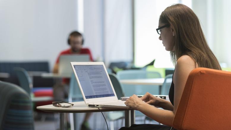 Students studying in quiet study area in Library