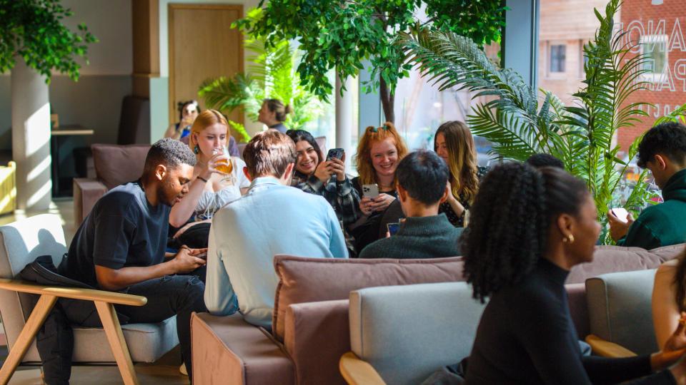 Students sitting in the sofa area of Manor Park Social